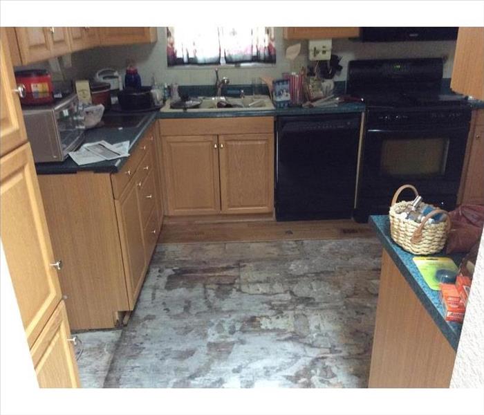 removed wood flooring in a kitchen