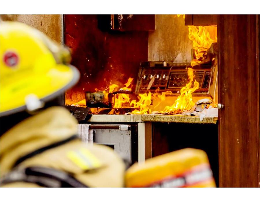 fireman in kitchen fire