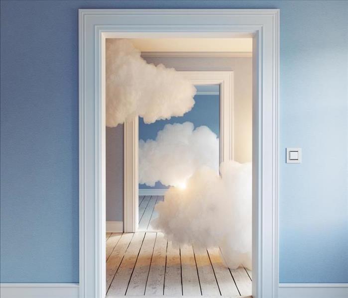 smoke from fire through a doorway opening